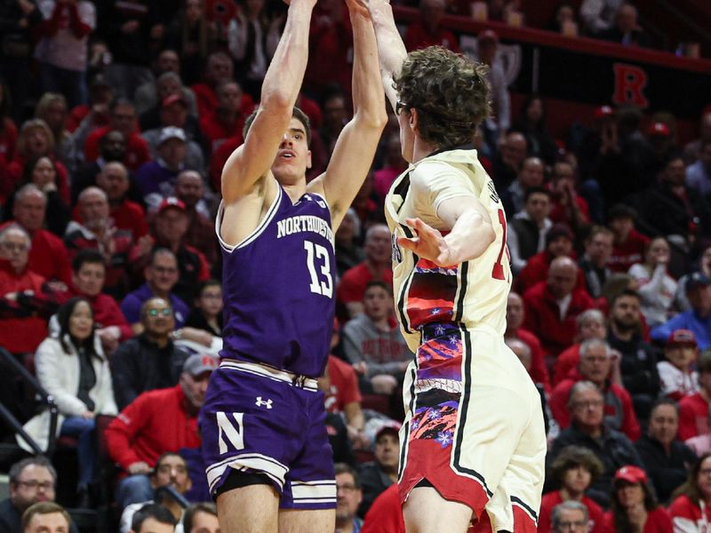 Feb 15, 2024; Piscataway, New Jersey, USA; Northwestern Wildcats guard Brooks Barnhizer (13) shoots against Rutgers Scarlet Knights guard Gavin Griffiths (10) during the first half at Jersey Mike's Arena. Mandatory Credit: Vincent Carchietta-USA TODAY Sports