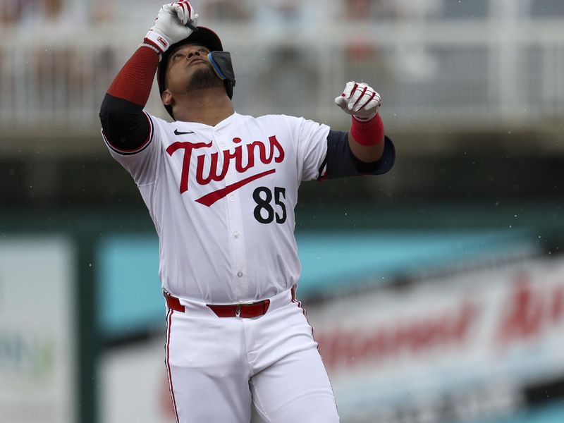 Mar 6, 2024; Fort Myers, Florida, USA;  Minnesota Twins catcher Jair Camargo (85) reacts after hitting a double against the Boston Red Sox in the third inning at Hammond Stadium. Mandatory Credit: Nathan Ray Seebeck-USA TODAY Sports