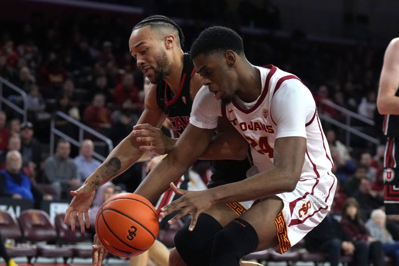 January 14, 2023; Los Angeles, California, USA; Utah Utes guard Marco Anthony (10) and Southern California Trojans forward Joshua Morgan (24) reach for the ball in the second half at Galen Center. Mandatory Credit: Kirby Lee-USA TODAY Sports