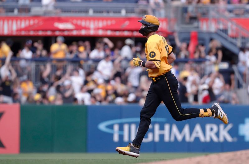 May 24, 2024; Pittsburgh, Pennsylvania, USA;  Pittsburgh Pirates third baseman Jared Triolo (19) circles the bases on a two-run home run against the Atlanta Braves during the fifth inning at PNC Park. Mandatory Credit: Charles LeClaire-USA TODAY Sports