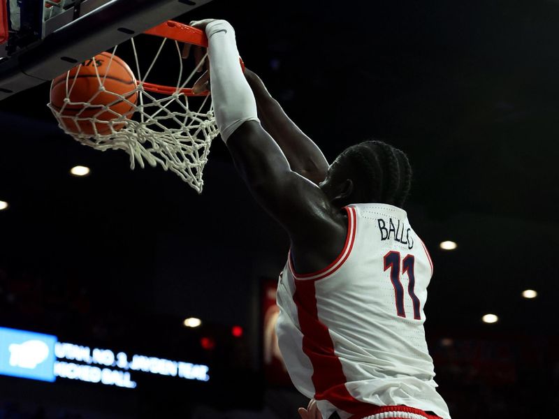 Jan 6, 2024; Tucson, Arizona, USA; Arizona Wildcats center Oumar Ballo (11) makes a basket for his 1,000th career point agaisnt the Utah Utes during the second half at McKale Center. Mandatory Credit: Zachary BonDurant-USA TODAY Sports