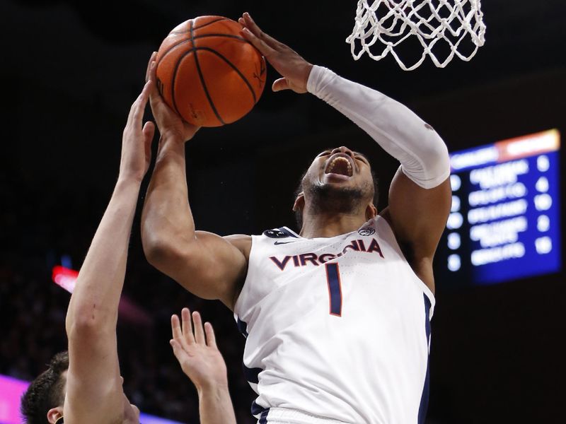 Feb 18, 2023; Charlottesville, Virginia, USA; Virginia Cavaliers forward Jayden Gardner (1) shoots the ball as Notre Dame Fighting Irish forward Matt Zona (25) defends during the second half at John Paul Jones Arena. Mandatory Credit: Amber Searls-USA TODAY Sports