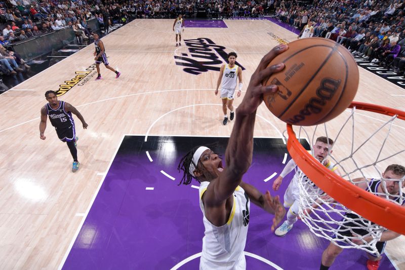 SACRAMENTO, CA - MARCH 31: Taylor Hendricks #0 of the Utah Jazz dunks the ball during the game against the Sacramento Kings on March 31, 2024 at Golden 1 Center in Sacramento, California. NOTE TO USER: User expressly acknowledges and agrees that, by downloading and or using this Photograph, user is consenting to the terms and conditions of the Getty Images License Agreement. Mandatory Copyright Notice: Copyright 2024 NBAE (Photo by Rocky Widner/NBAE via Getty Images)