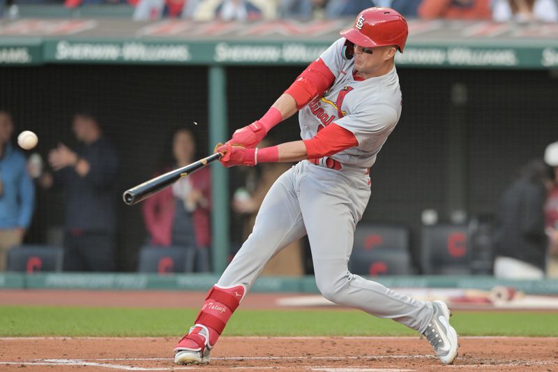 May 26, 2023; Cleveland, Ohio, USA; St. Louis Cardinals center fielder Lars Nootbaar (21) hits a single during the third inning against the Cleveland Guardians at Progressive Field. Mandatory Credit: Ken Blaze-USA TODAY Sports