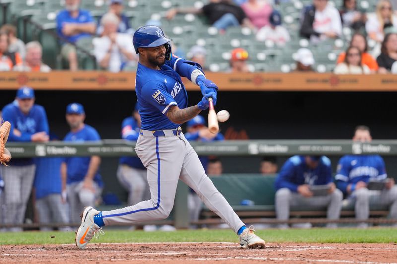 May 4, 2025; Baltimore, Maryland, USA; Kansas City Royals third baseman Maikel Garcia (11) hits a home run against the Baltimore Orioles during the fifth inning at Oriole Park at Camden Yards. Mandatory Credit: Gregory Fisher-Imagn Images