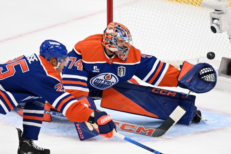 Jun 4, 2025; Edmonton, Alberta, CAN; Edmonton Oilers goaltender Stuart Skinner (74) gives up a goal to Florida Panthers center Brad Marchand (not pictured) during the first period in game one of the 2025 Stanley Cup Final at Rogers Place. Mandatory Credit: Walter Tychnowicz-Imagn Images