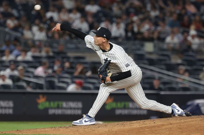 Jun 6, 2024; Bronx, New York, USA; New York Yankees relief pitcher Luke Weaver (30) delivers a pitch during the sixth inning against the Minnesota Twins at Yankee Stadium. Mandatory Credit: Vincent Carchietta-USA TODAY Sports