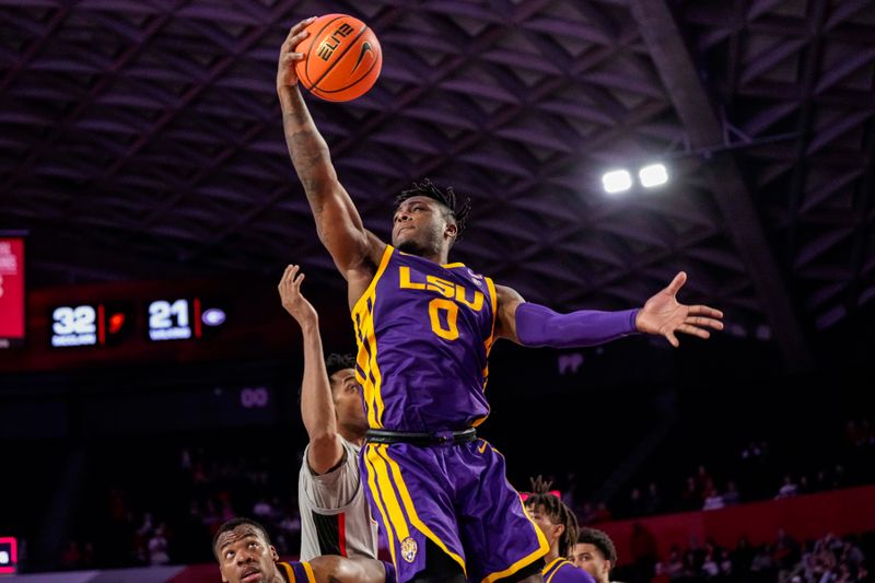 Feb 14, 2023; Athens, Georgia, USA; LSU Tigers guard Trae Hannibal (0) grabs a rebound against the Georgia Bulldogs during the second half at Stegeman Coliseum. Mandatory Credit: Dale Zanine-USA TODAY Sports