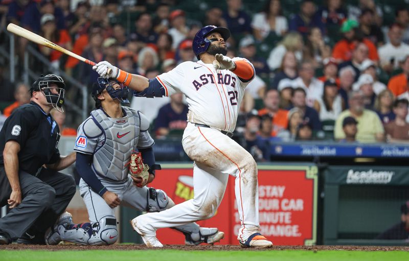 May 2, 2024; Houston, Texas, USA; Houston Astros first baseman Jon Singleton (28) hits a home run during the sixth inning against the Cleveland Guardians at Minute Maid Park. Mandatory Credit: Troy Taormina-USA TODAY Sports