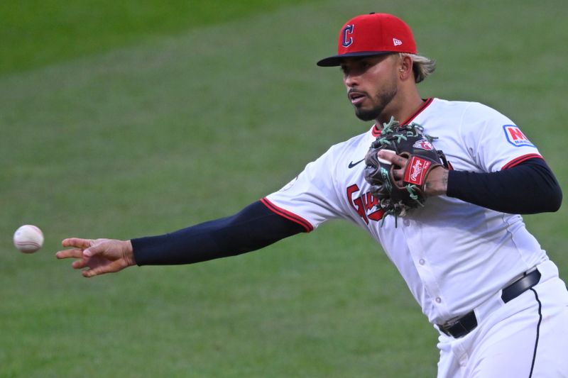 Apr 12, 2025; Cleveland, Ohio, USA; Cleveland Guardians second baseman Gabriel Arias (13) throws to first base in the fifth inning against the Kansas City Royals at Progressive Field. Mandatory Credit: David Richard-Imagn Images