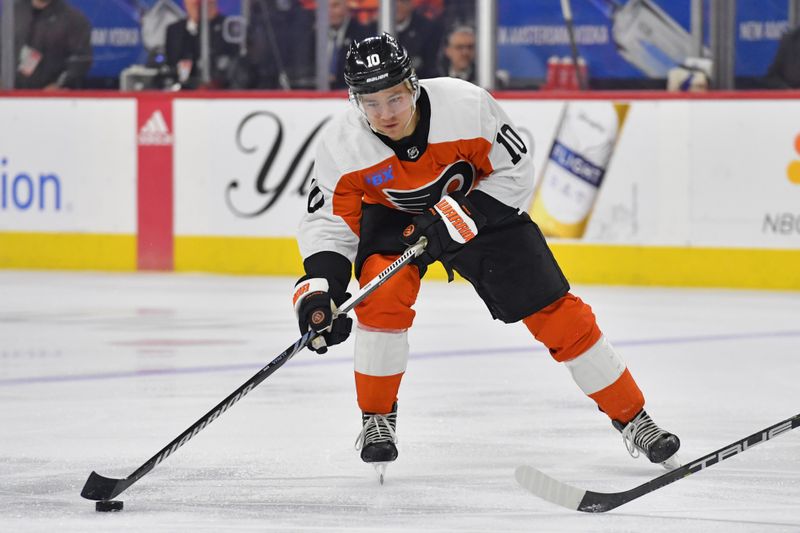 Feb 27, 2024; Philadelphia, Pennsylvania, USA; Philadelphia Flyers right wing Bobby Brink (10) shoots the puck against the Tampa Bay Lightning during the first period at Wells Fargo Center. Mandatory Credit: Eric Hartline-USA TODAY Sports