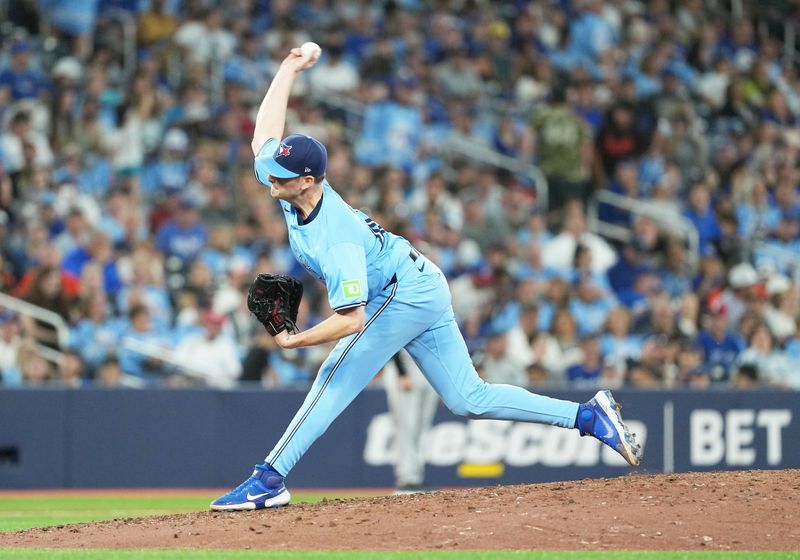 Aug 7, 2024; Toronto, Ontario, CAN; Toronto Blue Jays relief pitcher Ryan Burr (43) throws a pitch against the Baltimore Orioles during the seventh inning at Rogers Centre. Mandatory Credit: Nick Turchiaro-USA TODAY Sports