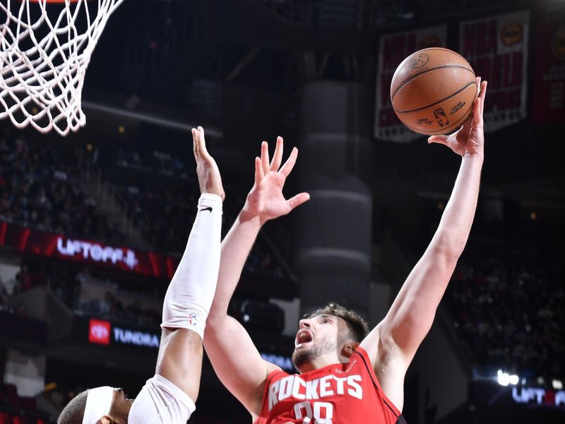 HOUSTON, TX - JANUARY 01   Alperen Sengun #28 of the Houston Rockets shoots the ball during the game against the Dallas Mavericks on January 01, 2025 at the Toyota Center in Houston, Texas. NOTE TO USER: User expressly acknowledges and agrees that, by downloading and or using this photograph, User is consenting to the terms and conditions of the Getty Images License Agreement. Mandatory Copyright Notice: Copyright 2025 NBAE (Photo by Logan Riely/NBAE via Getty Images)