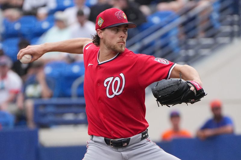Feb 28, 2026; Port St. Lucie, Florida, USA;  Washington Nationals pitcher Jake Irvin (27) pitches in the first inning against the New York Mets at Clover Park. Mandatory Credit: Jim Rassol-Imagn Images