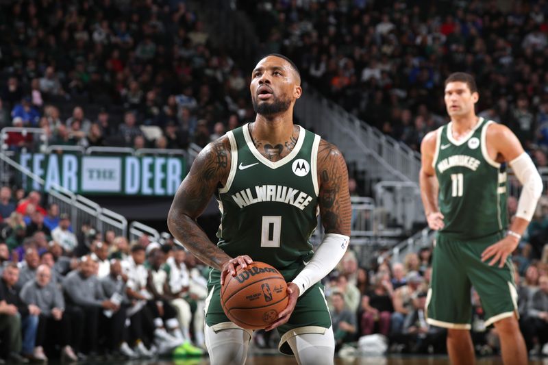 MILWAUKEE, WI - NOVEMBER 20: Damian Lillard #0 of the Milwaukee Bucks prepares to shoot a free throw during the game against the Chicago Bulls on November 20, 2024 at the Fiserv Forum Center in Milwaukee, Wisconsin. NOTE TO USER: User expressly acknowledges and agrees that, by downloading and or using this Photograph, user is consenting to the terms and conditions of the Getty Images License Agreement. Mandatory Copyright Notice: Copyright 2024 NBAE (Photo by Gary Dineen/NBAE via Getty Images).