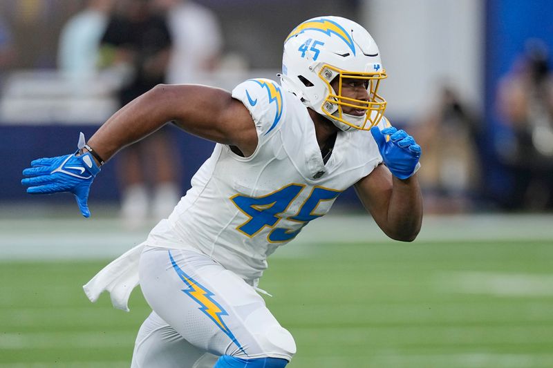 Los Angeles Chargers linebacker Tuli Tuipulotu (45) defends during the first half of a preseason NFL football game against the Los Angeles Rams Saturday, Aug. 12, 2023, in Inglewood, Calif. (AP Photo/Mark J. Terrill)