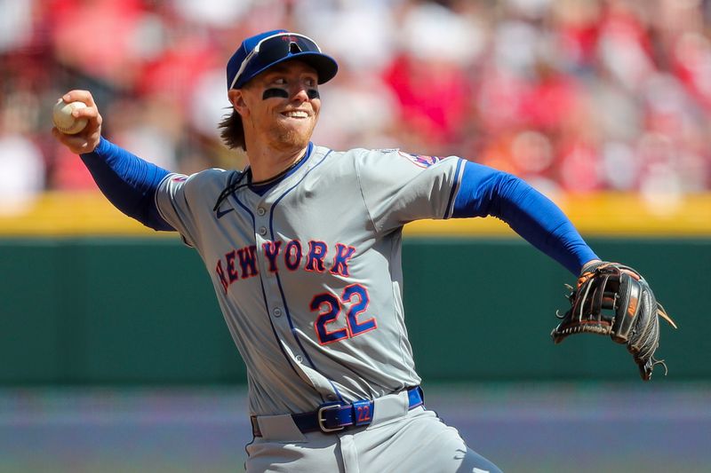 Apr 7, 2024; Cincinnati, Ohio, USA; New York Mets third baseman Brett Baty (22) throws to first to get Cincinnati Reds first baseman Christian Encarnacion-Strand (not pictured) out in the fifth inning at Great American Ball Park. Mandatory Credit: Katie Stratman-USA TODAY Sports