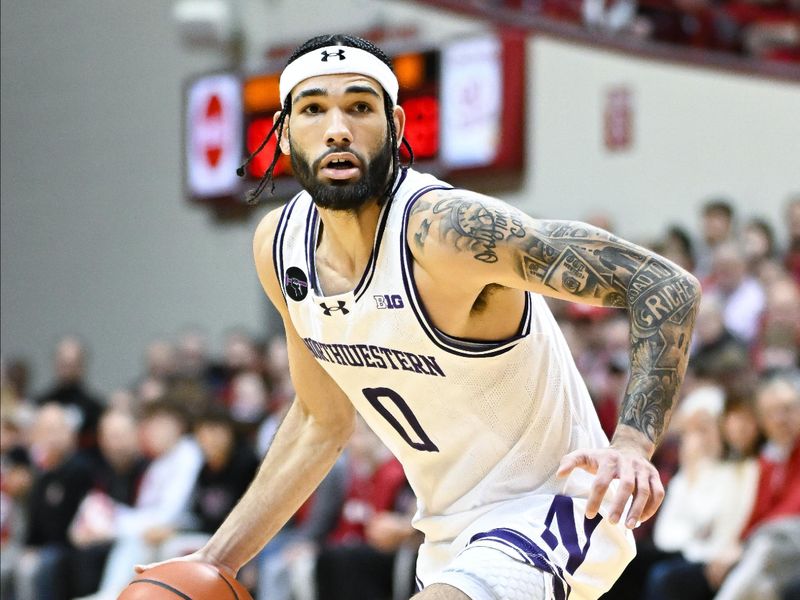 Feb 18, 2024; Bloomington, Indiana, USA;  Northwestern Wildcats guard Boo Buie (0) dribbles the ball against the Indiana Hoosiers during the second half at Simon Skjodt Assembly Hall. Mandatory Credit: Robert Goddin-USA TODAY Sports