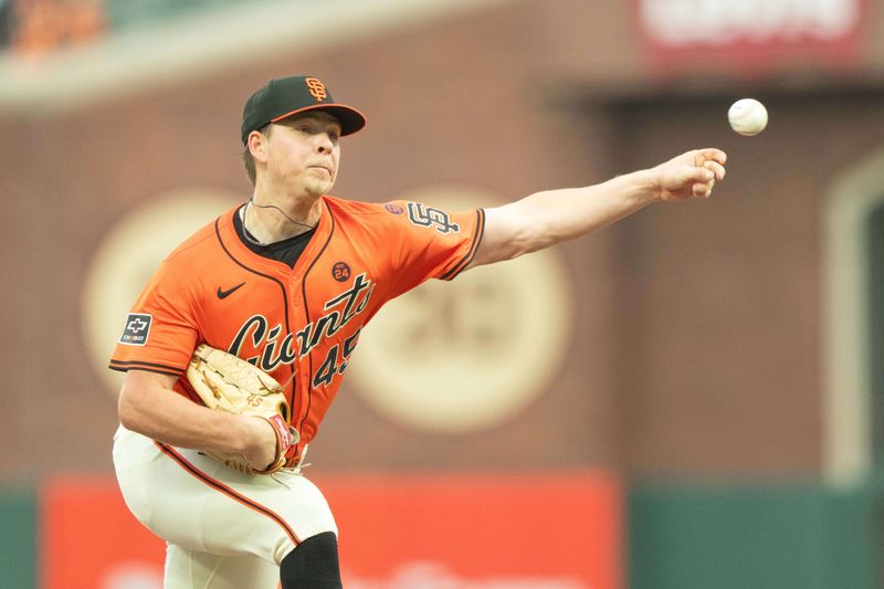 Jul 26, 2024; San Francisco, California, USA;  San Francisco Giants pitcher Kyle Harrison (45) pitches during the first inning against the Colorado Rockies at Oracle Park. Mandatory Credit: Stan Szeto-USA TODAY Sports