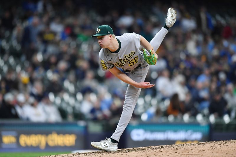 Apr 20, 2025; Milwaukee, Wisconsin, USA; Oakland Athletics relief pitcher Noah Murdock (58) pitches during the seventh inning against the Milwaukee Brewers at American Family Field. Mandatory Credit: Patrick Gorski-Imagn Images