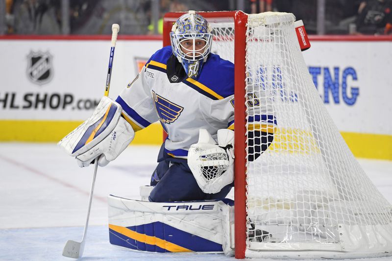 Oct 31, 2024; Philadelphia, Pennsylvania, USA; St. Louis Blues goaltender Jordan Binnington (50) against the Philadelphia Flyers during the first period at Wells Fargo Center. Mandatory Credit: Eric Hartline-Imagn Images