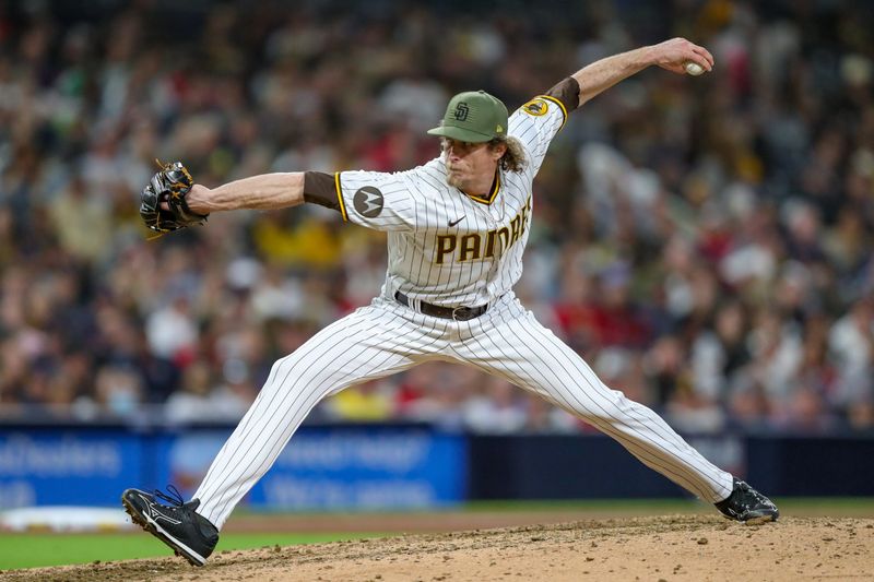 May 20, 2023; San Diego, California, USA; San Diego Padres relief pitcher Tim Hill (25) throws a pitch in the seventh inning against the Boston Red Sox at Petco Park. Mandatory Credit: David Frerker-USA TODAY Sports