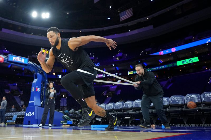 PHILADELPHIA, PENNSYLVANIA - OCTOBER 16: Ben Simmons #10 of the Brooklyn Nets warms up prior to the preseason game against the Philadelphia 76ers at the Wells Fargo Center on October 16, 2024 in Philadelphia, Pennsylvania. NOTE TO USER: User expressly acknowledges and agrees that, by downloading and/or using this photograph, user is consenting to the terms and conditions of the Getty Images License Agreement. (Photo by Mitchell Leff/Getty Images)