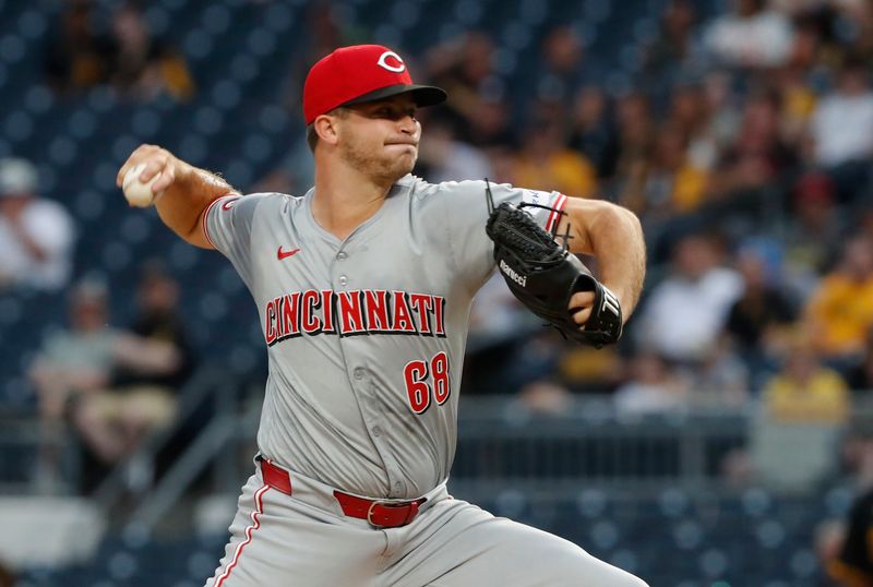 Jun 17, 2024; Pittsburgh, Pennsylvania, USA;  Cincinnati Reds starting pitcher Carson Spiers (68) delivers a pitch against the Pittsburgh Pirates during the first inning at PNC Park. Mandatory Credit: Charles LeClaire-USA TODAY Sports