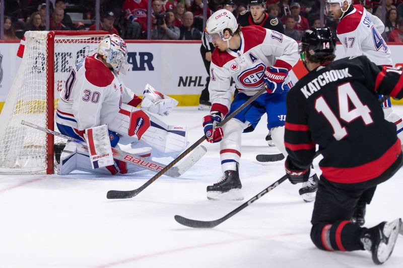 Apr 13, 2024; Ottawa, Ontario, CAN; Montreal Canadiens goalie Cayden Primeau (30) makes a save on a shot from Ottawa Senators left wing Boris Katchouk (14) in the first period at the Canadian Tire Centre. Mandatory Credit: Marc DesRosiers-USA TODAY Sports