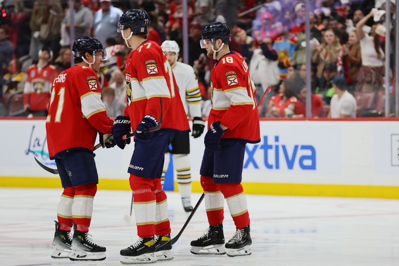 May 8, 2024; Sunrise, Florida, USA; Florida Panthers center Steven Lorentz (18) talks to center Evan Rodrigues (17) after scoring against the Boston Bruins during the second period in game two of the second round of the 2024 Stanley Cup Playoffs at Amerant Bank Arena. Mandatory Credit: Sam Navarro-USA TODAY Sports