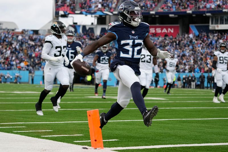 Tennessee Titans running back Tyjae Spears (32) runs into the end zone for a touchdown during the first half of an NFL football game against the Jacksonville Jaguars, Sunday, Jan. 7, 2024, in Nashville, Tenn. (AP Photo/George Walker IV)