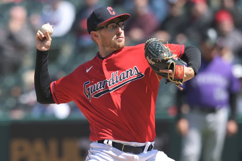 Apr 26, 2023; Cleveland, Ohio, USA; Cleveland Guardians starting pitcher Tanner Bibee (61) throws a pitch during the third inning against the Colorado Rockies at Progressive Field. Mandatory Credit: Ken Blaze-USA TODAY Sports