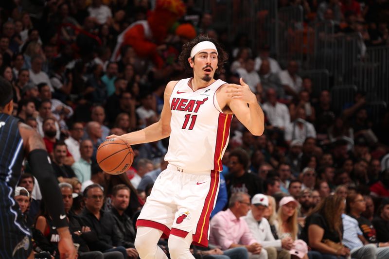 MIAMI, FL - OCTOBER 23: Jaime Jaquez Jr. #11 of the Miami Heat handles the ball during the game against the Orlando Magic on October 23, 2024 at Kaseya Center in Miami, Florida. NOTE TO USER: User expressly acknowledges and agrees that, by downloading and or using this Photograph, user is consenting to the terms and conditions of the Getty Images License Agreement. Mandatory Copyright Notice: Copyright 2024 NBAE (Photo by Issac Baldizon/NBAE via Getty Images)