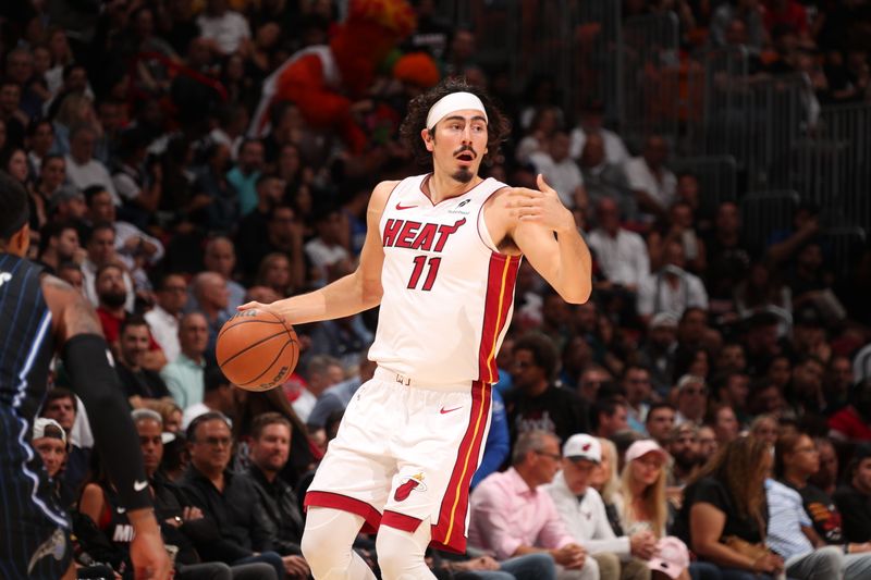 MIAMI, FL - OCTOBER 23: Jaime Jaquez Jr. #11 of the Miami Heat handles the ball during the game against the Orlando Magic on October 23, 2024 at Kaseya Center in Miami, Florida. NOTE TO USER: User expressly acknowledges and agrees that, by downloading and or using this Photograph, user is consenting to the terms and conditions of the Getty Images License Agreement. Mandatory Copyright Notice: Copyright 2024 NBAE (Photo by Issac Baldizon/NBAE via Getty Images)