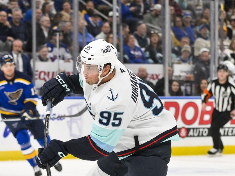 Feb 25, 2025; St. Louis, Missouri, USA;  Seattle Kraken left wing Andre Burakovsky (95) shoots against the St. Louis Blues during the first period at Enterprise Center. Mandatory Credit: Jeff Curry-Imagn Images