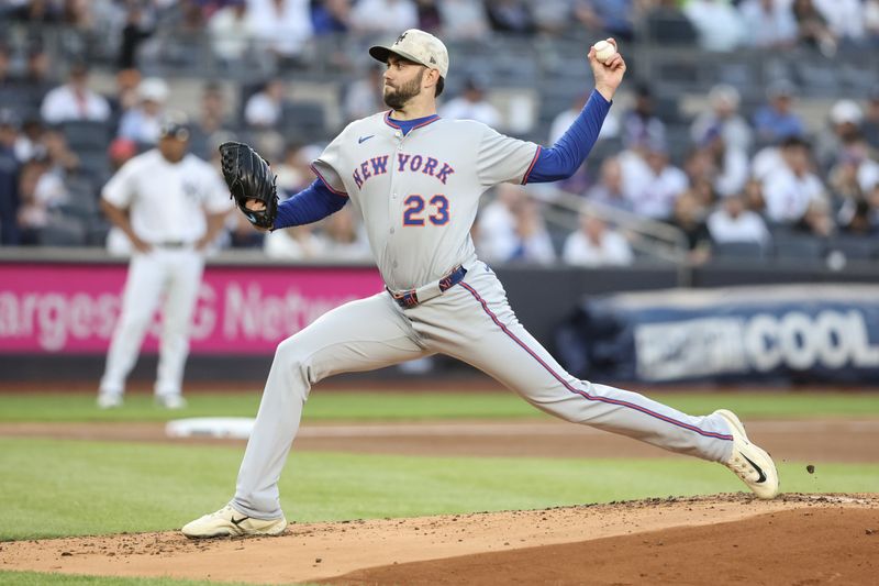 May 18, 2025; Bronx, New York, USA;  New York Mets starting pitcher David Peterson (23) pitches in the first inning against the New York Yankees at Yankee Stadium. Mandatory Credit: Wendell Cruz-Imagn Images