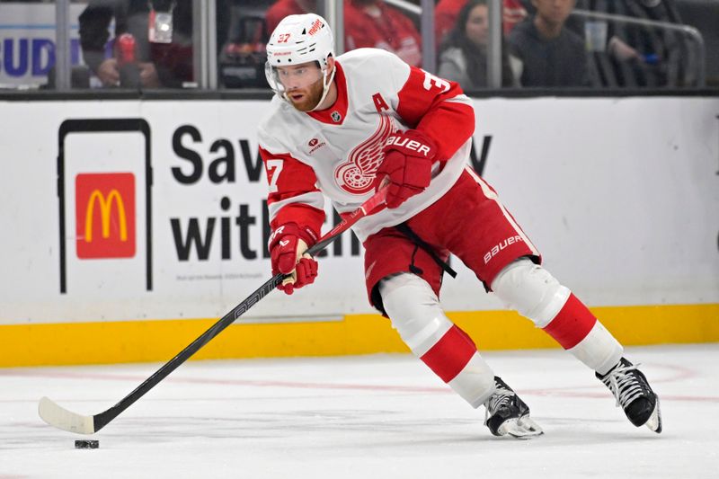 Nov 16, 2024; Los Angeles, California, USA; Detroit Red Wings left wing J.T. Compher (37) handles the puck in the first period against the Los Angeles Kings at Crypto.com Arena. Mandatory Credit: Jayne Kamin-Oncea-Imagn Images