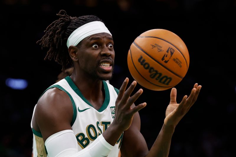 BOSTON, MA - JANUARY 19: Jrue Holiday #4 of the Boston Celtics reacts to having a double dribble called on him during the second half against the Denver Nuggets at TD Garden on January 19, 2024 in Boston, Massachusetts. NOTE TO USER: User expressly acknowledges and agrees that, by downloading and/or using this Photograph, user is consenting to the terms and conditions of the Getty Images License Agreement. (Photo By Winslow Townson/Getty Images)