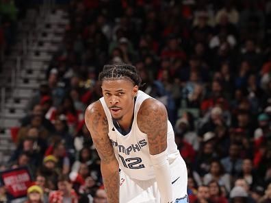 NEW ORLEANS, LA - DECEMBER 19: Ja Morant #12 of the Memphis Grizzlies looks on during the game against the New Orleans Pelicans on December 19, 2023 at the Smoothie King Center in New Orleans, Louisiana. NOTE TO USER: User expressly acknowledges and agrees that, by downloading and or using this Photograph, user is consenting to the terms and conditions of the Getty Images License Agreement. Mandatory Copyright Notice: Copyright 2023 NBAE (Photo by Jonathan Bachman/NBAE via Getty Images)