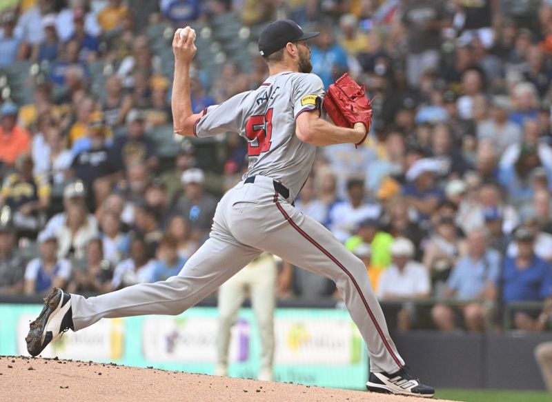 Jul 31, 2024; Milwaukee, Wisconsin, USA; Atlanta Braves pitcher Chris Sale (51) delivers against the Milwaukee Brewers in the first inning at American Family Field. Mandatory Credit: Michael McLoone-USA TODAY Sports