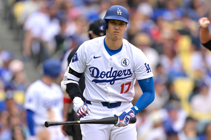 Jun 2, 2024; Los Angeles, California, USA;  Los Angeles Dodgers designated hitter Shohei Ohtani (17) reacts after fouling off a pitch in the fifth inning against the Colorado Rockies at Dodger Stadium. Mandatory Credit: Jayne Kamin-Oncea-USA TODAY Sports