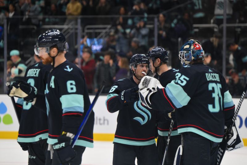 Nov 22, 2023; Seattle, Washington, USA; The Seattle Kraken celebrate defeating the San Jose Sharks at Climate Pledge Arena. Mandatory Credit: Steven Bisig-USA TODAY Sports