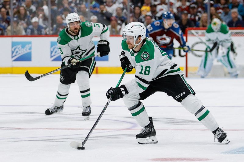 May 11, 2024; Denver, Colorado, USA; Dallas Stars center Sam Steel (18) controls the puck in the third period against the Colorado Avalanche in game three of the second round of the 2024 Stanley Cup Playoffs at Ball Arena. Mandatory Credit: Isaiah J. Downing-USA TODAY Sports