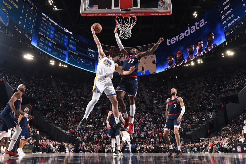 INGLEWOOD, CA - NOVEMBER 18: Brandin Podziemski #2 of the Golden State Warriors drives to the basket during the game against the LA Clippers on November 18, 2024 at Intuit Dome in Los Angeles, California. NOTE TO USER: User expressly acknowledges and agrees that, by downloading and/or using this Photograph, user is consenting to the terms and conditions of the Getty Images License Agreement. Mandatory Copyright Notice: Copyright 2024 NBAE (Photo by Juan Ocampo/NBAE via Getty Images)