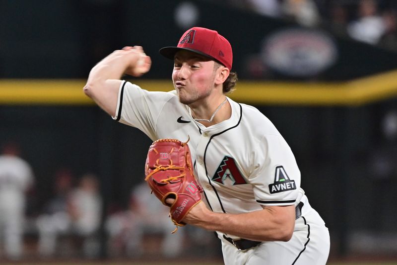 Apr 17, 2024; Phoenix, Arizona, USA;  Arizona Diamondbacks pitcher Brandon Pfaadt (32) throws in the first inning against the Chicago Cubs at Chase Field. Mandatory Credit: Matt Kartozian-USA TODAY Sports