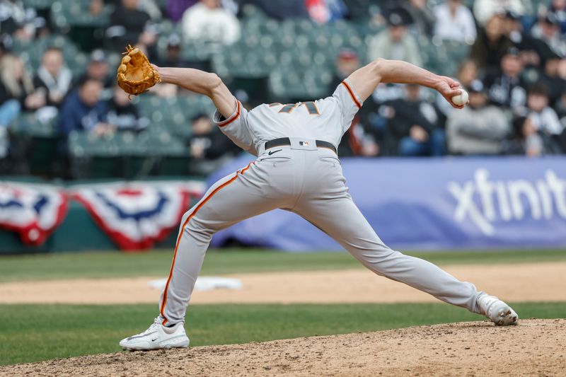 Apr 3, 2023; Chicago, Illinois, USA; San Francisco Giants relief pitcher Tyler Rogers (71) delivers against the Chicago White Sox during the ninth inning at Guaranteed Rate Field. Mandatory Credit: Kamil Krzaczynski-USA TODAY Sports