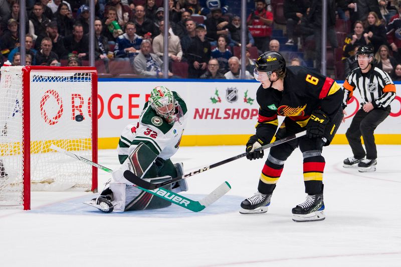 Dec 7, 2023; Vancouver, British Columbia, CAN; Vancouver Canucks forward Brock Boeser (6) hits the post behind Minnesota Wild goalie Filip Gustavsson (32) on a breakaway shot attempt in the third period at Rogers Arena. Vancouver won 2-0.  Mandatory Credit: Bob Frid-USA TODAY Sports