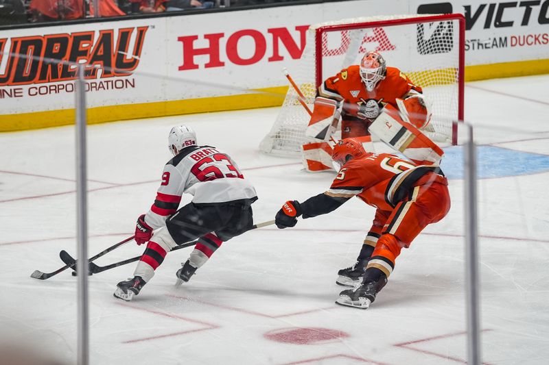 Nov 2, 2025; Anaheim, California, USA;  New Jersey Devils left wing Jesper Bratt (63) attempts a shot during the third period at Honda Center. Mandatory Credit: Corinne Votaw-Imagn Images