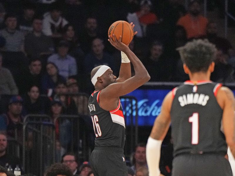 NEW YORK, NY - JANUARY 9: Duop Reath #26 of the Portland Trail Blazers shoots the ball during the game against the New York Knicks on January 9, 2024 at Madison Square Garden in New York City, New York.  NOTE TO USER: User expressly acknowledges and agrees that, by downloading and or using this photograph, User is consenting to the terms and conditions of the Getty Images License Agreement. Mandatory Copyright Notice: Copyright 2024 NBAE  (Photo by Jesse D. Garrabrant/NBAE via Getty Images)