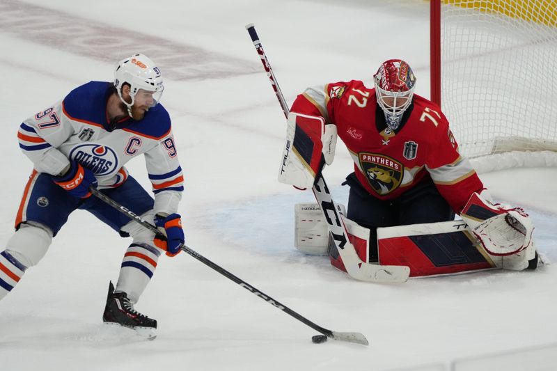 Jun 24, 2024; Sunrise, Florida, USA; Florida Panthers goaltender Sergei Bobrovsky (72) defends against Edmonton Oilers forward Connor McDavid (97) during the third period in game seven of the 2024 Stanley Cup Final at Amerant Bank Arena. Mandatory Credit: Jim Rassol-USA TODAY Sports